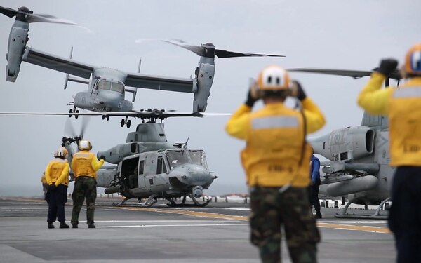 Watch these sailors and Marines work in concert to conduct flight ops