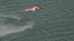 A Coast Guard HC-130 Hercules airplane crew from Air Station Elizabeth City, North Carolina, finds a distressed man aboard a sailboat waving his arms for help about five miles west of Portsmouth Island, North Carolina, Aug. 7, 2017. An MH-60 Jayhawk helicopter crew from the air station deployed a rescue swimmer, hoisted the man from the sailboat and brought him to The Outer Banks Hospital in Nags Head, North Carolina. (U.S. Coast Guard video by Air Station Elizabeth City/Released) 