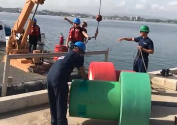Coast Guard Aids to Navigation Team San Juan members load navigational aids onto a 55-foot aids to navigation boat to bring critical ATON to the waterways around St. Thomas, U.S. Virgin Islands, Tuesday, Sept. 12, 2017. 