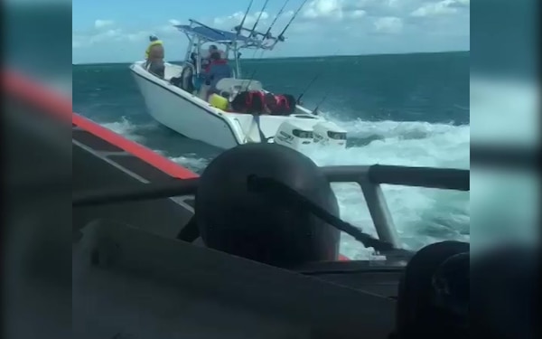 A Coast Guard Station Islamorada boatcrew rescues and assists 10 people on a recreational vessel taking water south of Islamorada, Florida Friday, Nov. 17, 2017. 