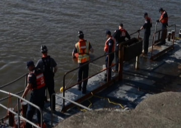 Various Coast Guard members and Alaska Chadux Corporation personnel give an oil spill response demonstration in Bethel, Alaska, July 25, 2018. The purpose of this demonstration was to showcase booming tactics used for oil spill response on Alaskan waters. U.S. Coast Guard video by Petty Officer 3rd Class Lauren Dean.