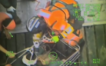 An MH-60 Jayhawk helicopter crew from Coast Guard Air Station Sitka medevacs an injured 42-year-old woman off a fishing vessel north of Noyes Island, Alaska, July 18, 2019. The woman had suffered a head injury while working aboard the fishing vessel Western Cruiser in the water west of the island. U.S. Coast Guard video courtesy Air Station Sitka.
