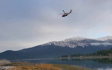 An MH-60 Jayhawk helicopter crew from Coast Guard Air Station Sitka conducts a search along the Gastineau Channel after a vessel was found unmanned and adrift near the Juneau-Douglas Bridge, Alaska, Nov. 29, 2019. The search was suspended after all people reported potentially involved were accounted for and no other signs of distress were observed. U.S. Coast Guard video by Petty Officer 3rd Class Amanda Norcross.