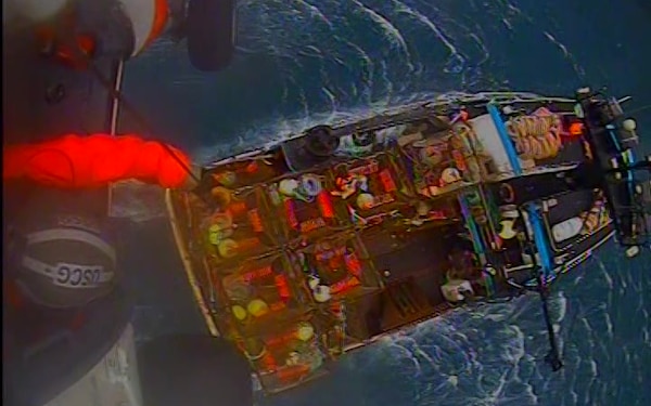 A Coast Guard MH-60 Jayhawk helicopter crew from Air Station Kodiak medevacs an injured fisherman Saturday, March 14, 2020 from a boat southwest of Kodiak Island. The aircrew hoisted the 49-year-old man from the 58-foot fishing vessel Alaskan Dream, transported him to Air Station Kodiak, and placed in the care of awaiting local EMS. (U.S. Coast Guard video by Air Station Kodiak)