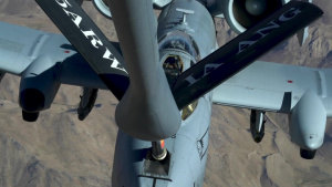 A U.S. Air Force KC-135 Stratotanker refuels A-10 Thunderbolts.