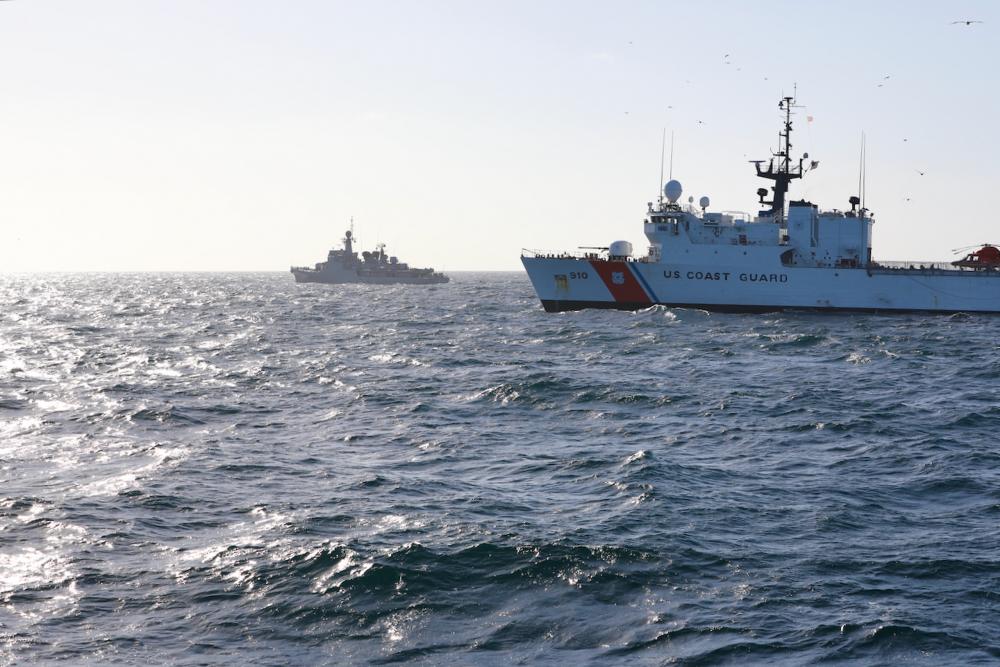 USCGC Thetis (WMEC 910) and a Royal Moroccan Navy vessel are seen during the joint rescue of migrants in the Atlantic Ocean 