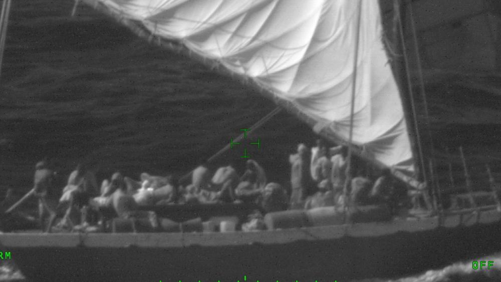 An overloaded 60-foot Haitian sailing vessel aaproximatrely 25 miles northeast of Anguilla Cay, Bahamas, Jan. 9, 2021. It was reported 176 people we on the unsafe and overloaded vessel. (U.S. Coast Guard photo.)