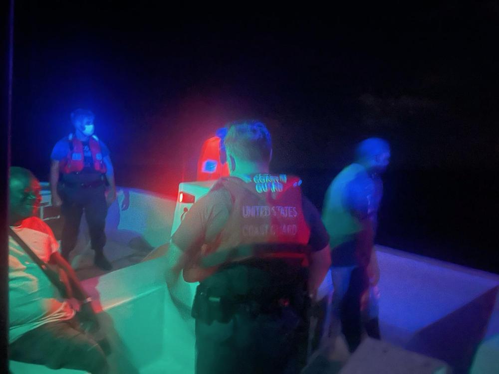 Coast Guard and British Virgin Islands authorities rescued four men Jan. 11, 2022 from a disabled vessel that was adrift for three days near the British Virgin Islands. Rescued are a French and three Dutch nationals, who were traveling aboard the 30-foot recreational vessel Water Baby Jan. 9, 2022 from Anguilla, British Virgin Islands to the Caribbean Leeward Island of Saint-Maarten, when their vessel reportedly ran out of gas. (U.S. Coast Guard photo).