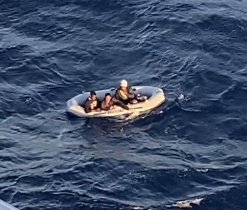 A cruise ship alerted Sector Key West watchstanders they rescued the people shown off a raft about 90 miles off Key West, Feb. 25, 2021. The people were repatriated to Cuba on March 3. (U.S. Coast Guard photo)