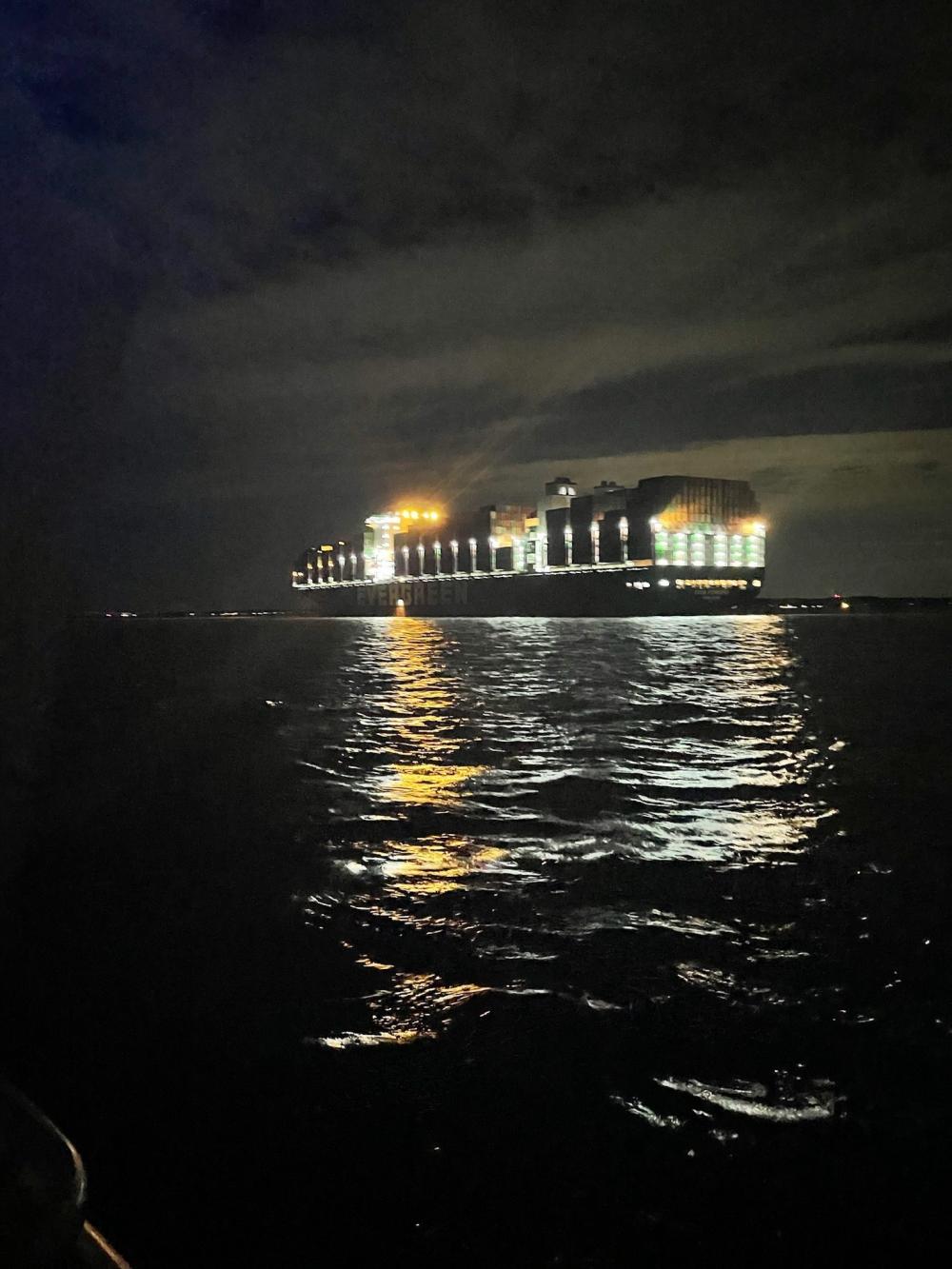 The 1,095 foot cargo vessel, Ever Forward, sits grounded in the Chesapeake Bay, near the Craigshill Channel, March 13, 2022. The Coast Guard is currently assessing the situation to determine the best and safest means of refloating the vessel. U.S. Coast Guard photo.