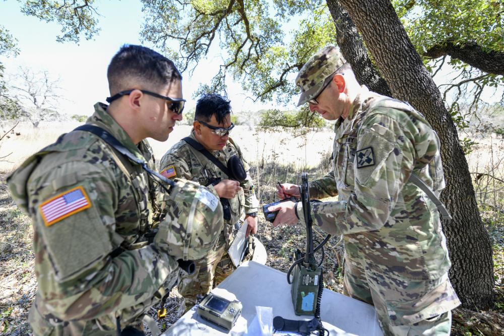 Soldiers doing radio maintenance