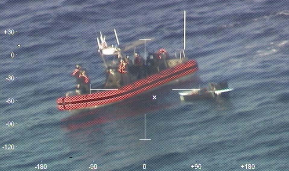 Coast Guard crews rescued two Cuban males 10 miles West of Bimini, Bahamas, March. 29, 2022. The two people are expected to be transferred to Royal Bahamas Defence Force authorities. (U.S. Coast Guard photo)