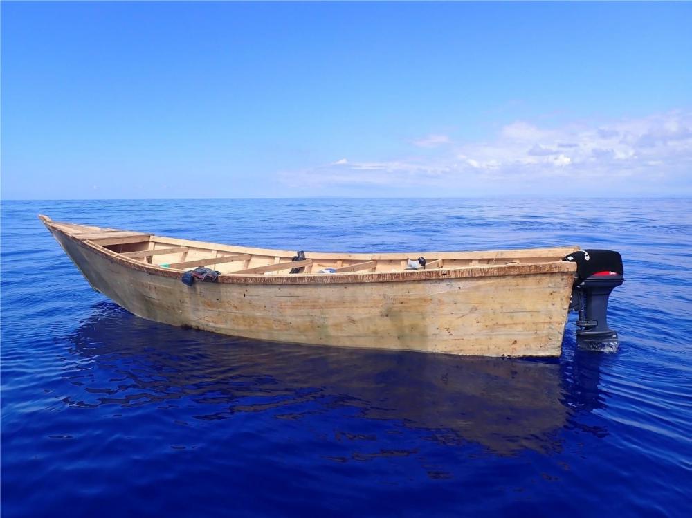 A 30-foot makeshift vessel that was taking part in an illegal voyage after it was interdicted by the Coast Guard Cutter Richard Dixon near Rincon, Puerto Rico March 28, 2022. The Coast Guard Cutter Richard Dixon transferred two Dominicans and 39 Haitians from the interdicted group to a Dominican Republic Navy vessel March 30, 2022. (U.S. Coast Guard photo)