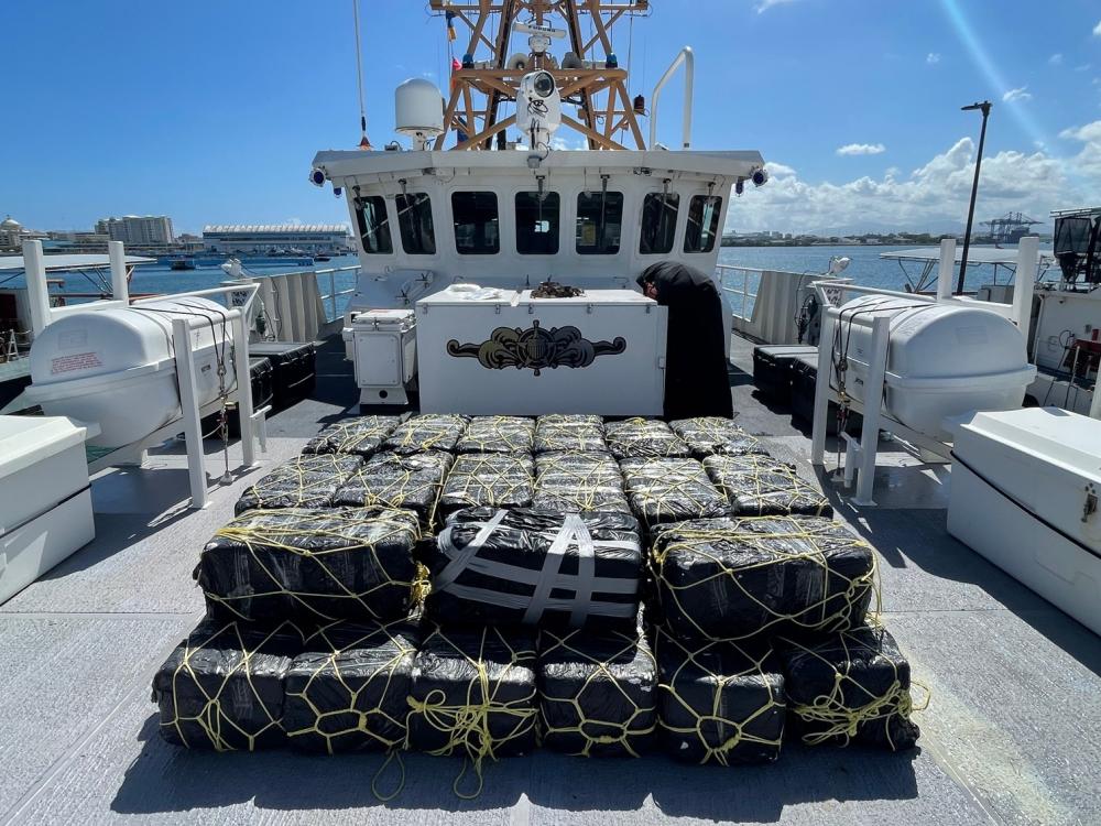 Coast Guard Cutter Donald Horsley’s crew offloaded approximately 1,000 kilograms of seized cocaine, valued at $20 million dollars, at Coast Guard Base San Juan April 4, 2022, following the interdiction of a go-fast vessel March 30, 2022 in the Caribbean Sea near Puerto Rico. Drug Enforcement Administration Special Agents received custody of two suspected smugglers and the seized contraband. This interdiction is the result of multi-agency efforts involving the Caribbean Border Interagency Group and the Caribbean Corridor Strike Force. (U.S. Coast Guard photo)