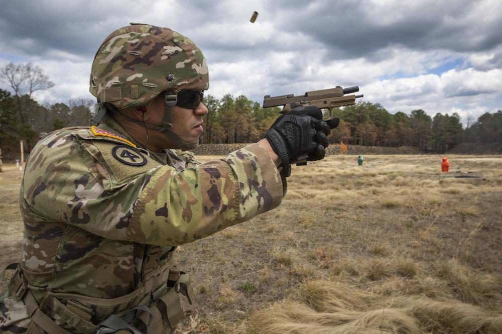 Soldier fires the M17 pistol