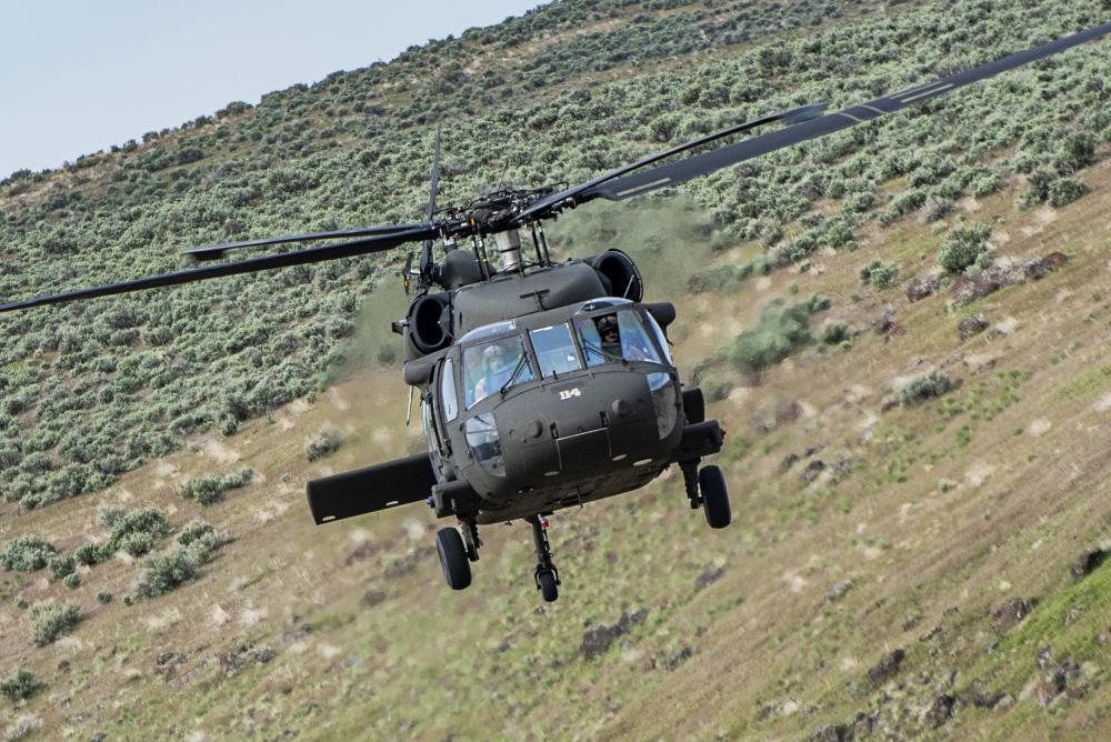 Black Hawk Helicopter practicing flight maneuvers.