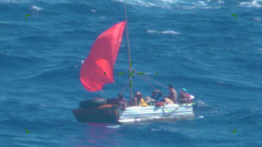 A Coast Guard Station Marathon law enforcement crew stops an rustic vessel approximately south of Long Key, Florida at about 10:45 a.m., May 1, 2022. The people were repatriated to Cuba on May 4, 2022. (U.S Coast Guard photo by Air Station Miami)
