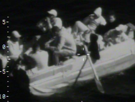 An illegal migration voyage is stopped approximately 10 miles south of Boca Chica Key, Florida, April 30, 2022. The Cubans were repatriated on May 7, 2022. (U.S. Coast Guard photo by Air Station Miami)