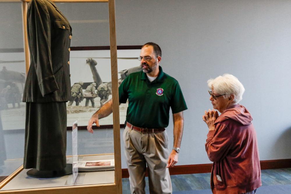 A USARCENT WWII Army Combat Nurse Uniform Stands in a case that holds untold stories