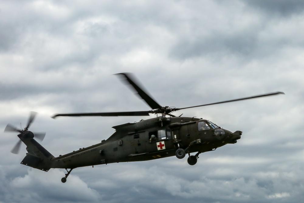 Soldiers conduct medical evacuation training in a MH-60 Blackhawk 