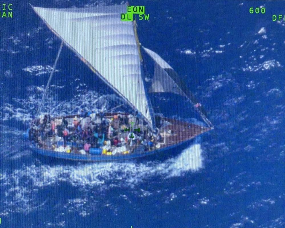 A Customs and Border Protection Air and Marine Operations air crew spotted the grossly overloaded vessel approximately 42 miles southeast of Islamorada, Florida, May 24, 2022. Coast Guard crews repatriated the 146 people on May 27, 2022. (Customs and Border Protection Air and Marine Operations photo)