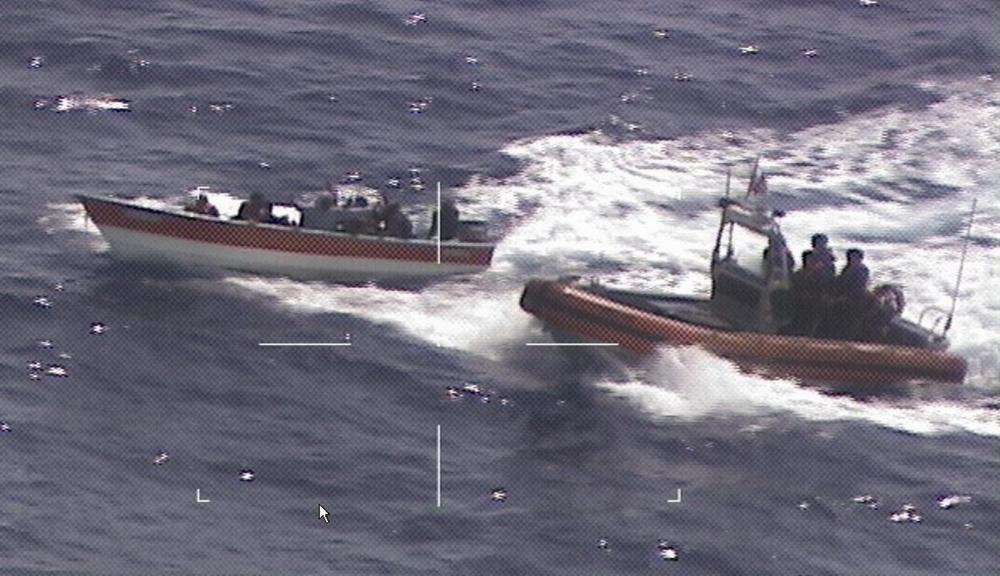 The Coast Guard Cutter Donald Horsley cutter boat interdicts an illegal voyage vessel with 21 non-U.S. citizens May 23, 2022, approximately 10 nautical miles south of Mona Island, Puerto Rico. The interdiction is the result of ongoing local and federal multi-agency efforts in support of the Caribbean Border Interagency Group CBIG. (U.S. Coast Guard photo)