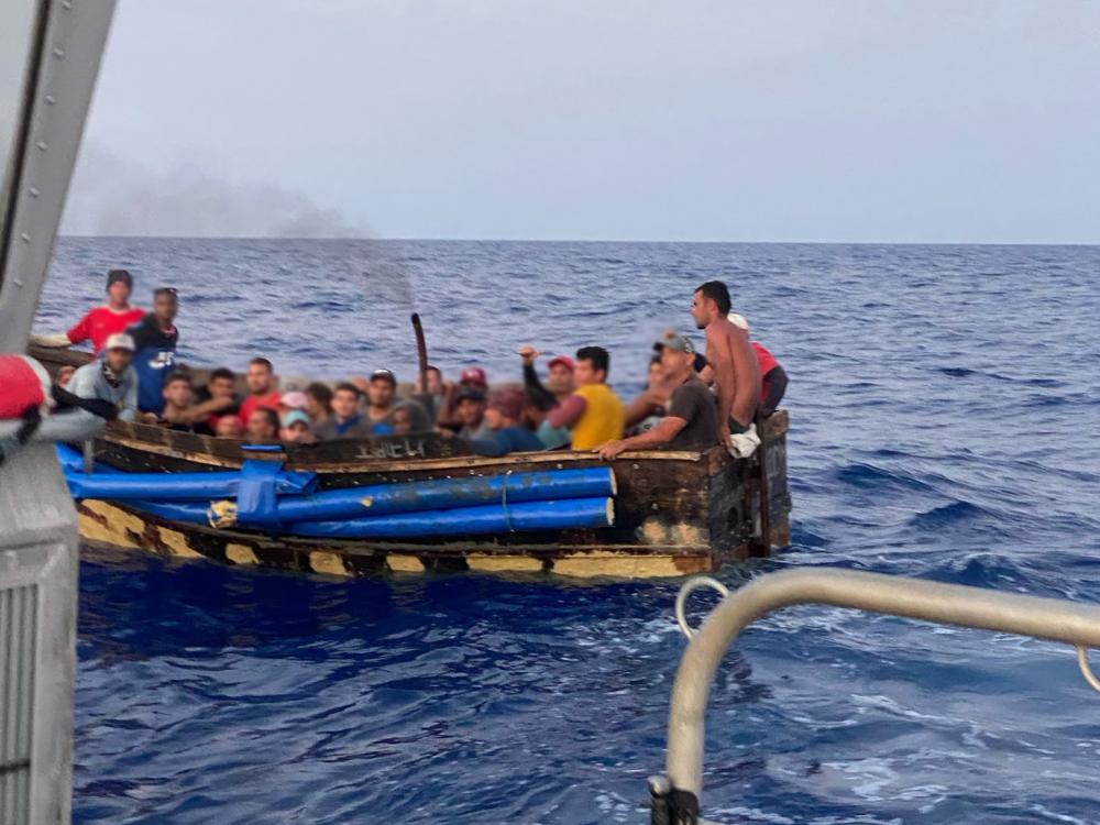 A Coast Guard Air Station Miami HC-144 Ocean Sentry aircrew alerted Sector Key West watchstanders of a rustic vessel about 30 miles southwest of Marquesas Key, Florida, June 8, 2022. The people were repatriated to Cuba on June 11, 2022. (U.S. Coast Guard photo by Station Key West's crew)