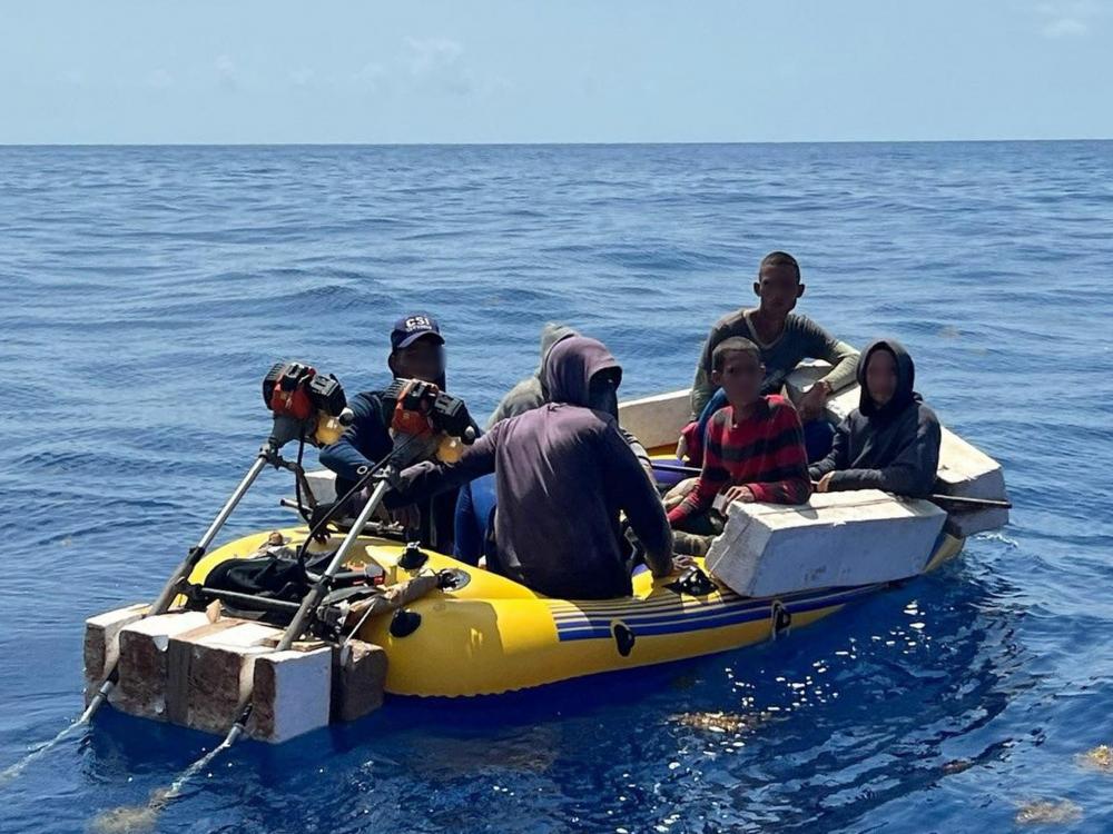 A good Samaritan notified Coast Guard Sector Key West watchstanders of a rustic vessel about 13 miles south of Marquesas Key, Florida, June 12, 2022. The people were repatriated to Cuba on June 17, 2022. (U.S. Coast Guard photo)