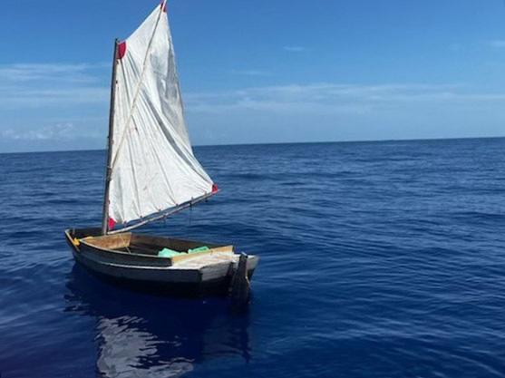 Coast Guard Station Miami's crew alerted Sector Miami watchstanders of this rustic vessel about 15 miles southeast of Government Cut, Miami, Florida, June 12, 2022. The people were repatriated to Cuba June 17, 2022. (U.S. Coast Guard Station Miami Beach photo)