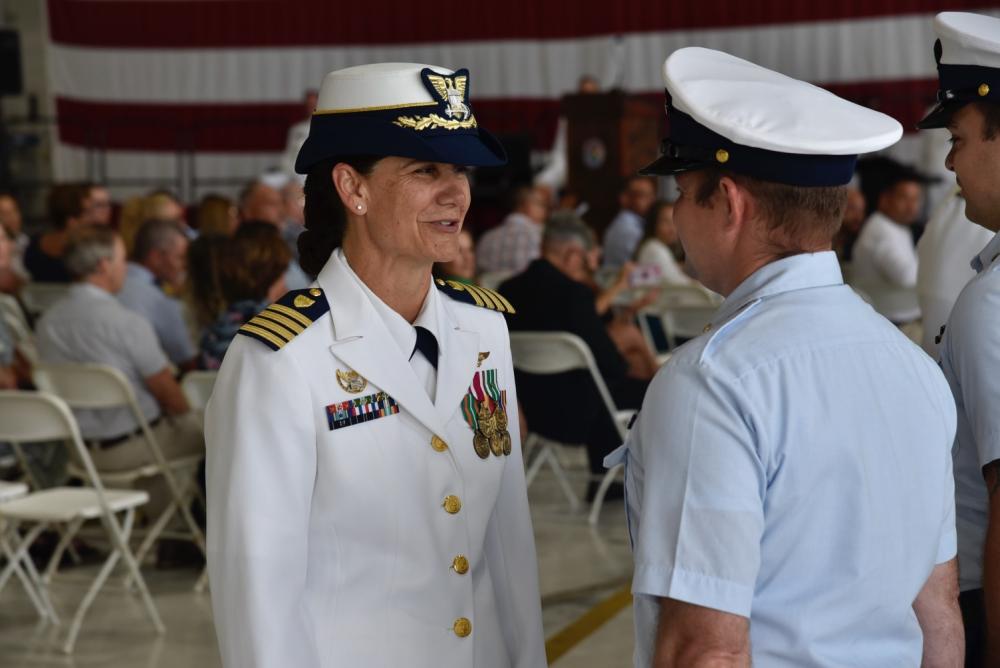Capt. Tina Peña bids farewell to Air Station Borinquen personnel during the unit’s change of command ceremony June 17, 2022. During the ceremony, Capt. Lawrence Gaillard relieved Capt. Peña as Air Station Borinquen’s commanding officer.  Capt. Gaillard assumes command of the Coastguardsmen and civilians, who along with the unit’s three MH-60T Jayhawk helicopters conduct search and rescue, law enforcement, homeland security, marine environmental protection, alien migrant interdiction, and counter-drug missions in Puerto Rico, the U.S. Virgin Islands and throughout the Eastern Caribbean. (U.S. Coast Guard photo by Ricardo Castrodad)