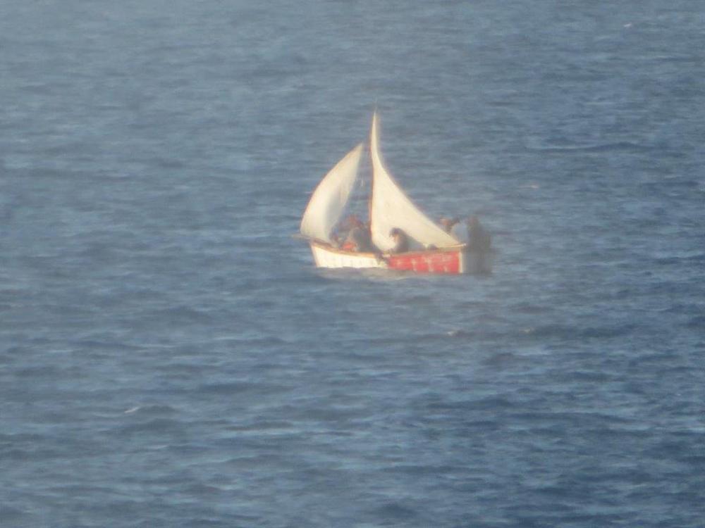 Coast Guard Cutter Hickory's crew alerted Coast Guard District Seven watchstanders of this rustic vessel about 30 miles southeast of Anguilla Cay, Bahamas, June 23, 2022. The people were repatriated on June 25, 2022. (U.S. Coast Guard photo)