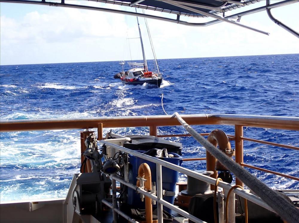 The Coast Guard Cutter Joseph Tezanos tows the sailing vessel Valour in the Atlantic Ocean June 24, 2022, approximately 300 nautical miles north of Puerto Rico. The four-day response involved Coast Guard air and surface crews, which rescued three mariners, U.S. citizens, and brought the sailing vessel to safe harbor in Fajardo, Puerto Rico the morning of June 26, 2022.
