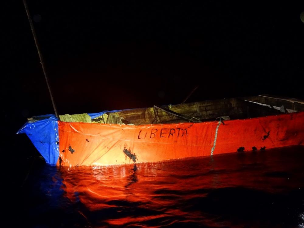 A Coast Guard Air Station Clearwater HC-130 aircrew alerted Coast Guard Sector Key West watchstanders to this rustic vessel about 63 miles east of Marathon, Florida, July 5, 2022. The people were repatriated to Cuba on July 8, 2022. (U.S. Coast Guard photo)