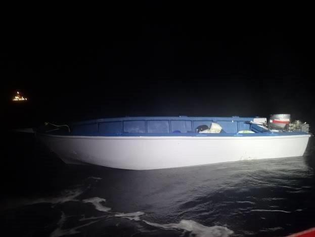 A makeshift vessel interdicted by the Coast Guard Cutter Joseph Doyle July 7, 2022 in Mona Passage waters near Puerto Rico. Twenty-four Dominicans and three Haitians who were taking part in an illegal voyage were safely removed from the vessel and returned to the Dominican Republic. (U.S. Coast Guard photo)