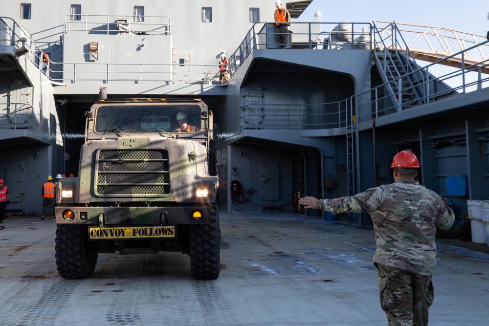 MRF-D 22: U.S. Marines work with U.S. Army and ADF to load LSV-3