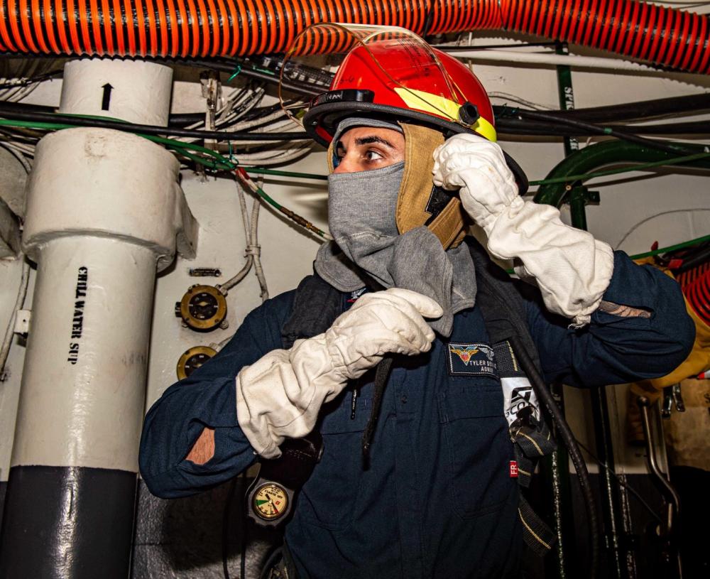 Sailor Participates in Damage Control Drill Aboard USS Carl Vinson