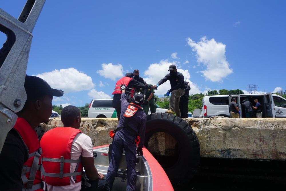 Coast Guard Cutter Joseph Napier’s small boat crew while completing the transfer of 68 Haitian survivors to Mayaguez, Puerto Rico July 29, 2022, who were abandoned offshore of Mona Island by smugglers the morning of July 28, 2022. (U.S. Coast Guard photo).