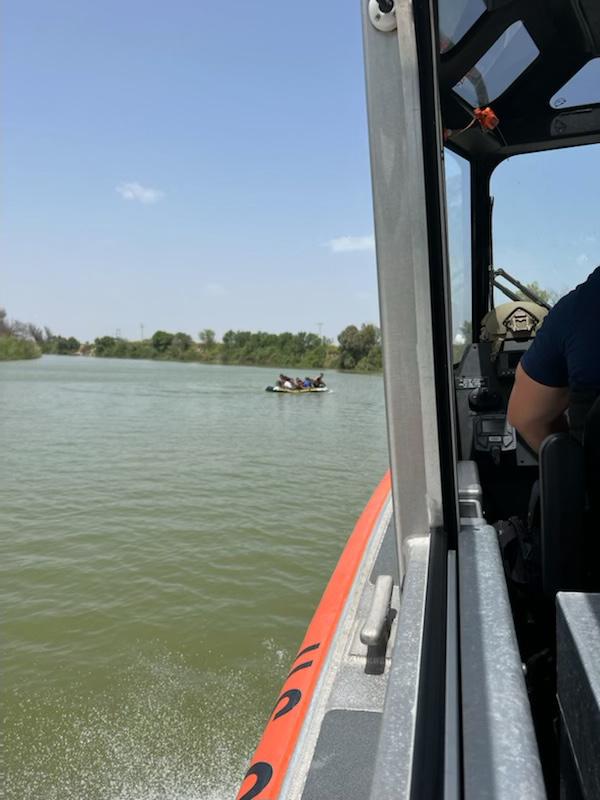 A 29-foot Response Boat–Small crew from Coast Guard Maritime Safety & Security Team Houston approaches 13 people trying to cross the Rio Grande at the U.S.-Mexico border, June 16, 2022. Three children jumped overboard as the Coast Guard crew approached, compelling Coast Guard Chief Petty Officer Charles Havlik to jump in and rescue a drowning teenage boy. (U.S. Coast Guard photo, courtesy Maritime Safety & Security Team Houston)