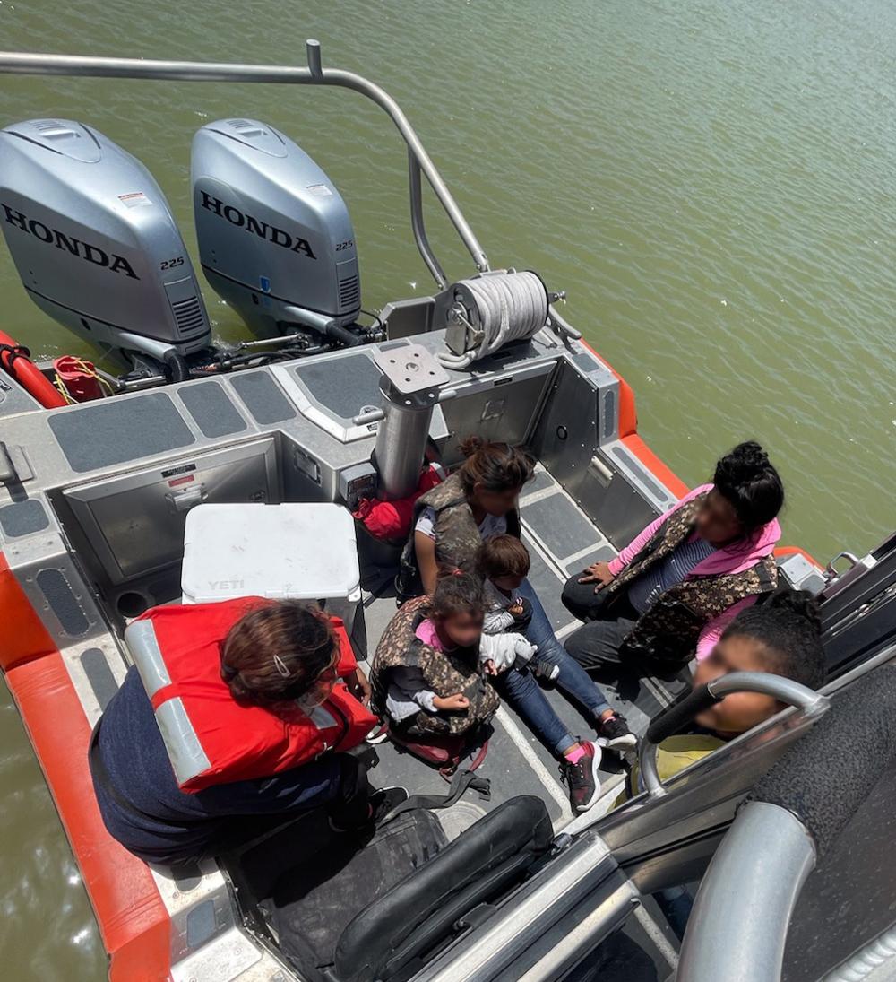 A 29-foot Response Boat–Small crew from Coast Guard Maritime Safety & Security Team Houston transports a family of non-citizens across the Rio Grande at the U.S.-Mexico border, June 12, 2022. Upon reaching the U.S. riverbank, the Coast Guard crew transferred the non-citizens to U.S. Border Patrol agents for further processing. (U.S. Coast Guard photo, courtesy Maritime Safety & Security Team Houston)