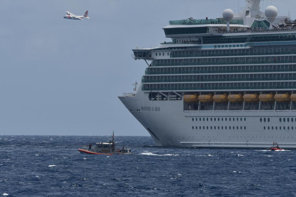 A cruise ship rescued one person and transferred the individual to Coast Guard crews after being found swimming off the Florida Keys, Aug. 5, 2022. The person's rustic vessel capsized approximately 14 miles off Sugarloaf Key. (U.S. Coast Guard photo by Coast Guard Cutter Issac Mayo's crew)