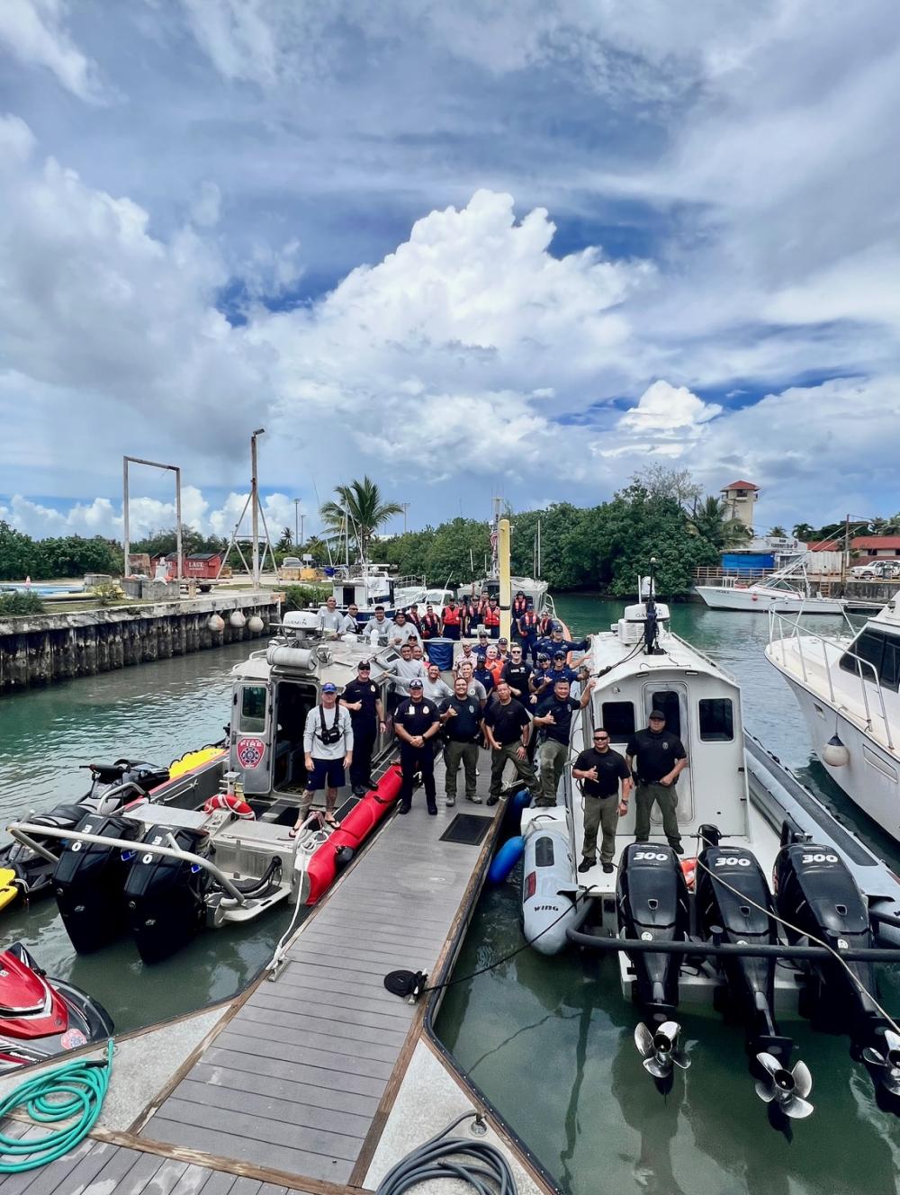 Responders take a moment for a photo at Agana Boat Basing following a successful search and rescue exercise Aug. 11, 2022. 
