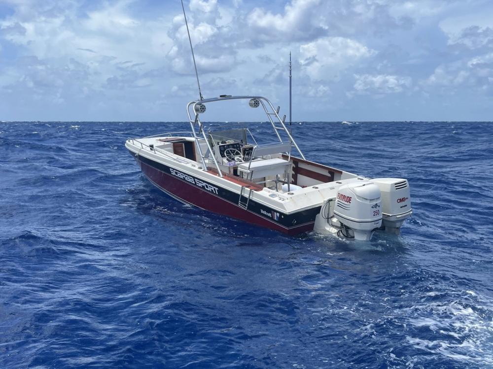 A good Samaritan notified Sector Key West watchstanders of this rustic boat with people in the water about 24 miles south of Boot Key, Florida, Aug. 6, 2022. The people were repatriated on Aug. 12, 2022. (U.S. Coast Guard photo)