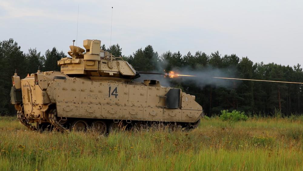 Troopers with 3rd Armored Brigade Combat Team, 1st Cavalry Division firing the 25mm canon on a Bradley fighting vehicle in order to zero the vehicles weapons systems