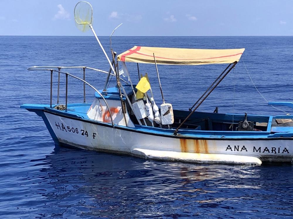 A Customs and Border Protection Air and Marine Operations aircrew alerted Sector Key West watchstanders of this fishing vessel about 25 miles south of Marquesas Key, Florida, Aug. 18, 2022. The people were repatriated to Cuba on Aug. 20, 2022. (U.S. Coast Guard photo)