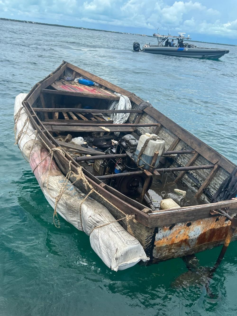 A good Samaritan notified Sector Key West watchstanders of this rustic vessel about 3 miles south of Snake Creek, Islamorada, Florida, Sept. 8, 2022. The people were repatriated to Cuba Sept. 11, 2022. The people were repatriated to Cuba on Sept. 11, 2022. (U.S. Coast Guard photo)