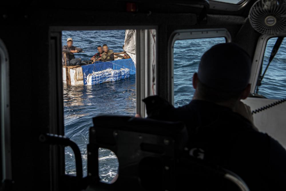 A deployed small boat law enforcement crew from Sector Key West stopped this rustic vessel about 18 miles south of Key West, Florida, Sept. 9, 2022. The people were repatriated to Cuba on Sept. 11, 2022. (U.S. Coast Guard photo by Petty Officer 2nd Class Ronald Hodges)