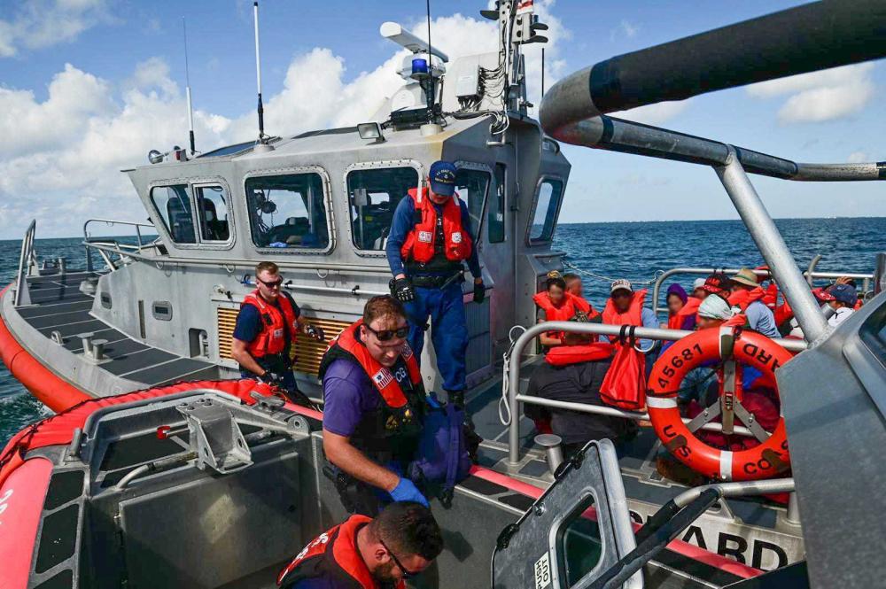 A Customs and Border Protection Air and Marine Operations aircrew alerted Sector Key West watchstanders of a sailing vessel about 12 miles southeast of Islamorada, Florida, Sept. 25, 2022. The people were repatriated to Cuba Sept. 30, 2022. (U.S. Coast Guard photo by Petty Officer 3rd Class Mikaela McGee)