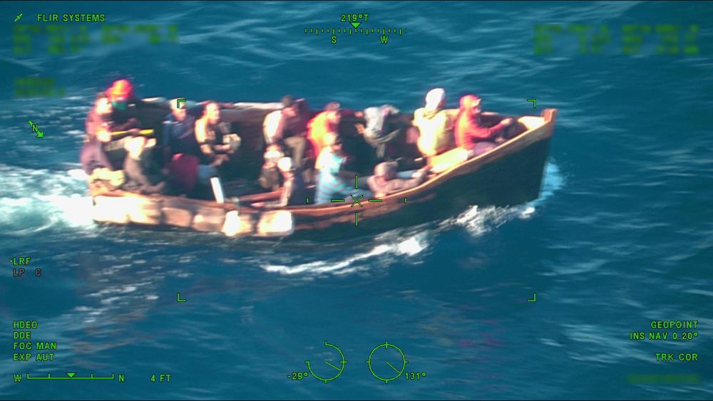 A Coast Guard Air Station Miami HC-144 Ocean Sentry airplane crew alerted Sector Key West of this rustic vessel taking on water, Monday, at approximately 7:30 a.m., about 30 miles south of Islamorada. The people were repatriated to Cuba on Oct. 5, 2022. (U.S. Coast Guard photo by Air Station Miami’s crew)