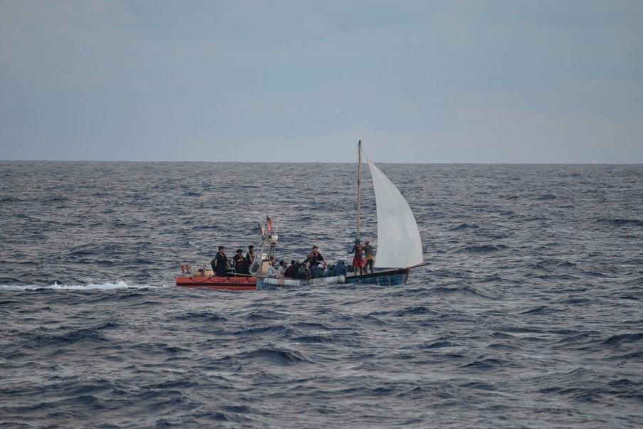 A Coast Guard Air Station Clearwater C-130 airplane crew alerted Sector Key West watchstanders of this rustic vessel about 35 miles southeast of Islamorada, Oct 4, 2022. The people were repatriated on Oct. 7, 2022. (Coast Guard courtesy photo)