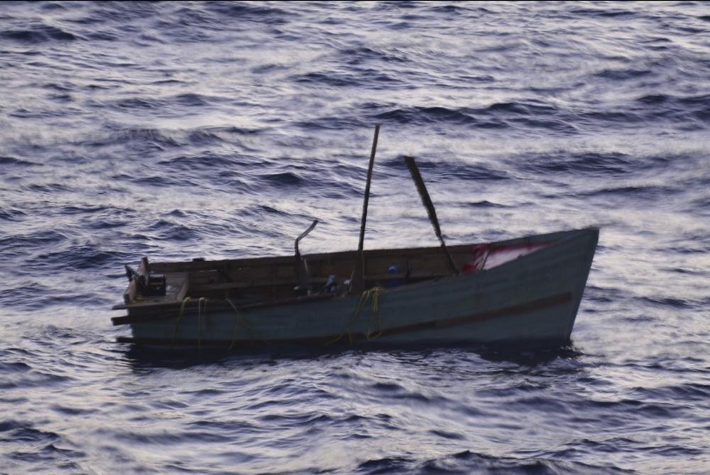 A Coast Guard Air Station Clearwater C-130 airplane crew alerted Sector Key West watchstanders of this rustic vessel about 15 miles south of Boca Grande, Oct. 4, 2022. The people were repatriated to Cuba Oct. 7, 2022. (Coast Guard courtesy photo)